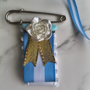 Escarapela prendedor flor